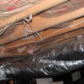 #13 Crawlspace After - Complete mold remediation has been performed, new insulation installed, electrical hazards corrected, and new vapor barrier installed.